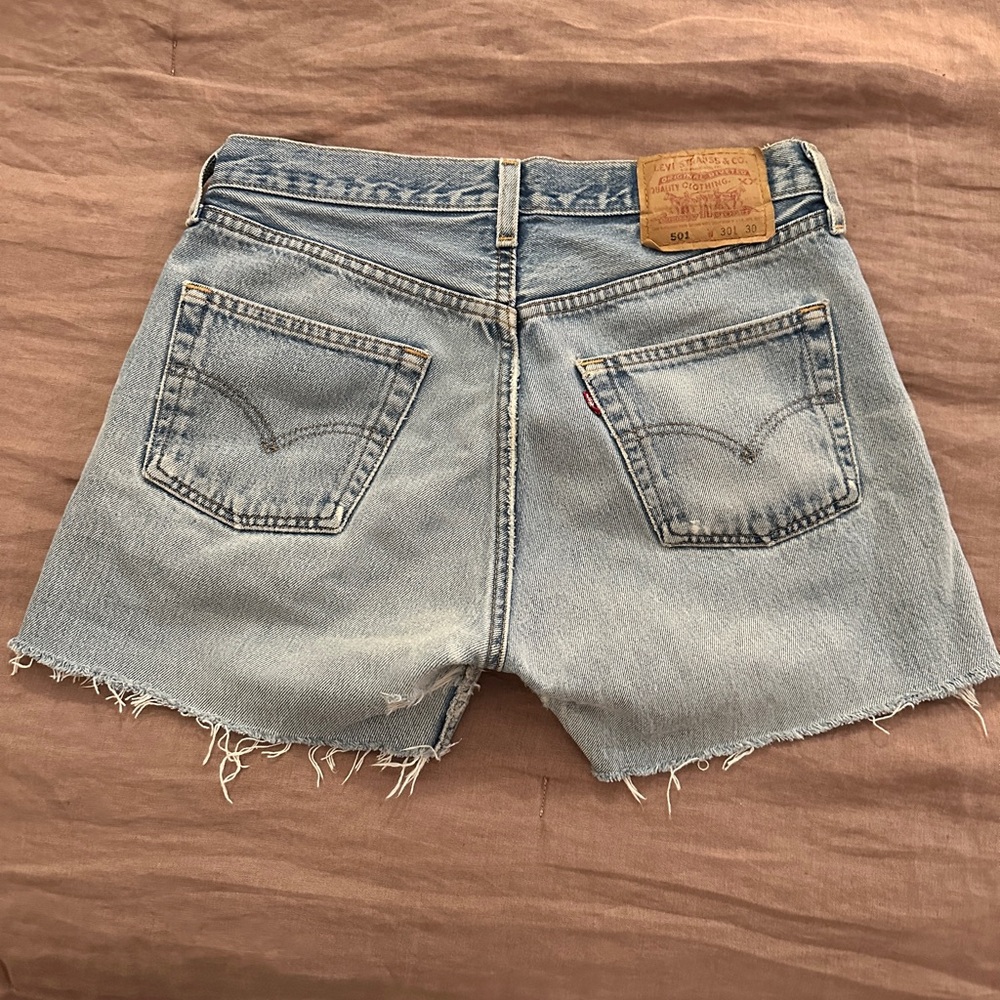 Vintage 501 Levi's Denim Jean Shorts with Distressed Hem size 26/27